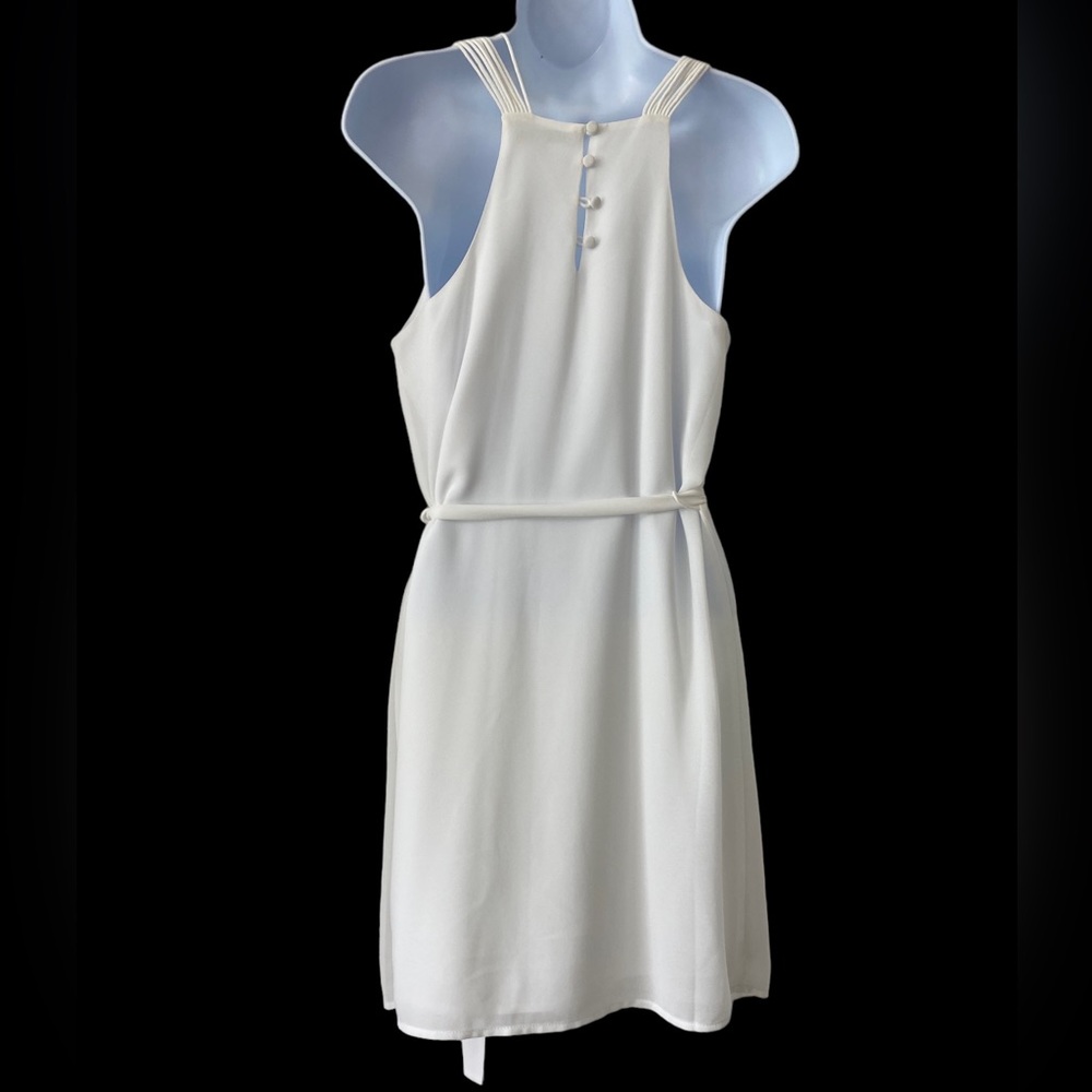 Cute white dress by Naked zebra. Size small